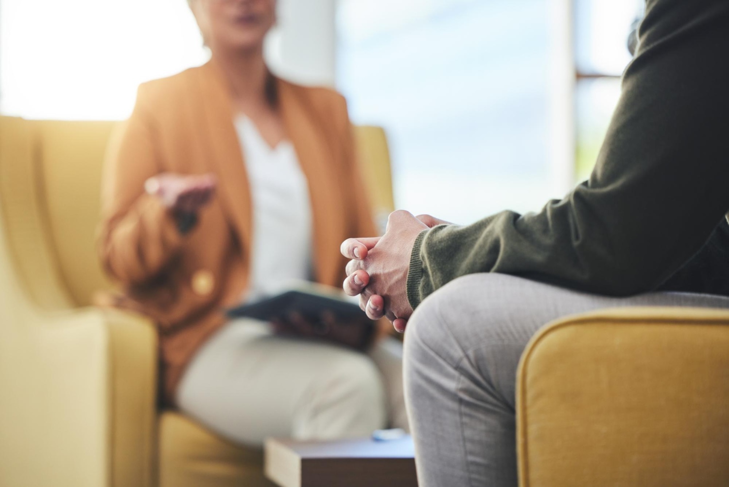 Therapist talking with a client about weed and marijuana use in a London consulting room